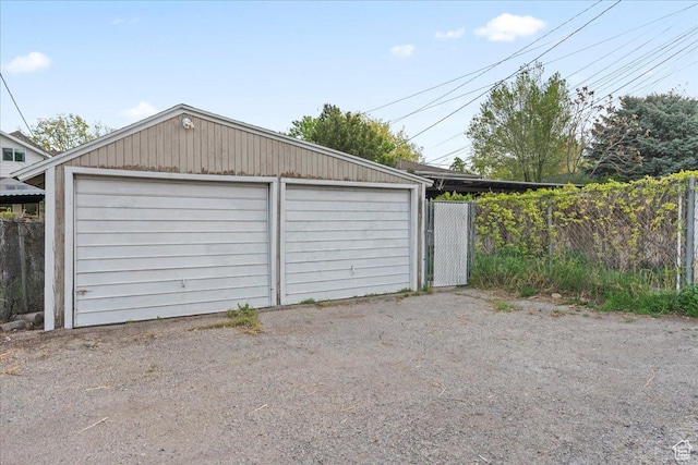 detached garage with fence