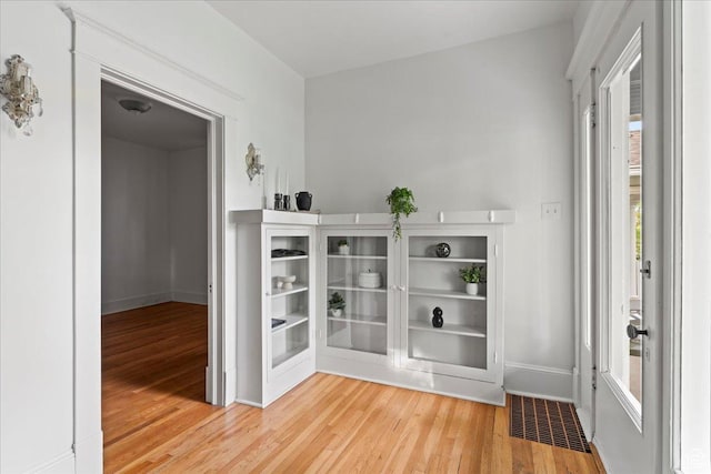 room details with wood finished floors and baseboards