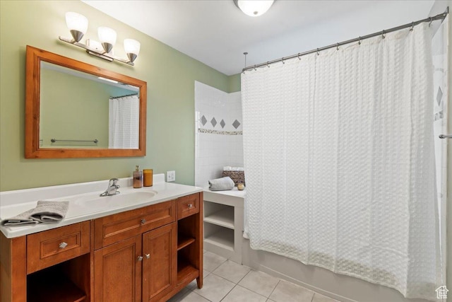 full bathroom featuring tile patterned floors, vanity, and shower / tub combo with curtain