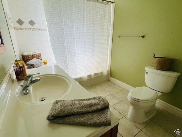 full bathroom with tile patterned floors, shower / bathtub combination with curtain, toilet, vanity, and baseboards