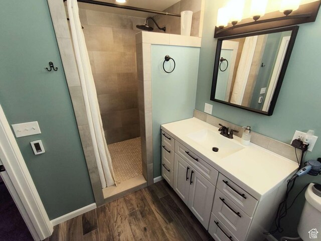 410 E 500 N, Ephraim, UT 84627 - bathroom featuring wood finished floors, vanity, and a walk in shower