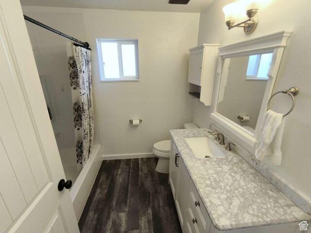 410 E 500 N, Ephraim, UT 84627 - bathroom featuring wood finished floors, a wealth of natural light, toilet, and baseboards