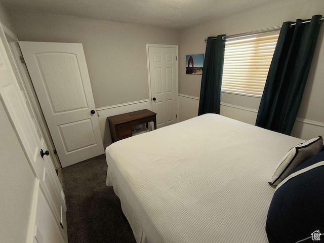 410 E 500 N, Ephraim, UT 84627 - bedroom featuring dark colored carpet
