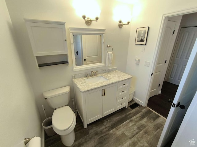 410 E 500 N, Ephraim, UT 84627 - bathroom with baseboards, wood finished floors, toilet, and vanity