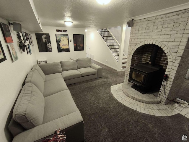 410 E 500 N, Ephraim, UT 84627 - carpeted living area featuring a wood stove, visible vents, baseboards, a textured ceiling, and stairs