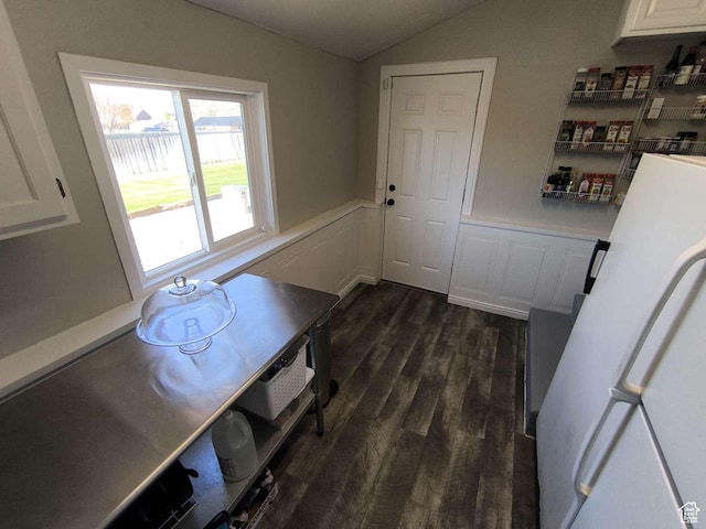 410 E 500 N, Ephraim, UT 84627 - unfurnished dining area with wainscoting, dark wood finished floors, and vaulted ceiling