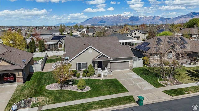 bird's eye view featuring a residential view and a mountain view