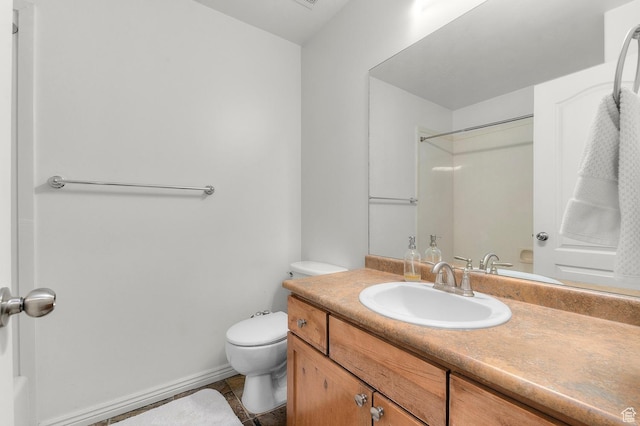 1962 E Meadow Downs Way S, Cottonwood Heights, UT 84121 - full bathroom featuring walk in shower, vanity, tile patterned flooring, and toilet