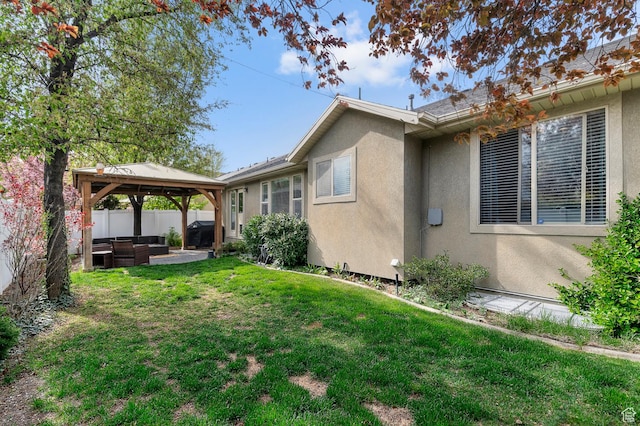 1962 E Meadow Downs Way S, Cottonwood Heights, UT 84121 - view of side of property featuring a lawn, an outdoor hangout area, a gazebo, and stucco siding