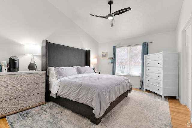 1962 E Meadow Downs Way S, Cottonwood Heights, UT 84121 - bedroom with vaulted ceiling, light wood finished floors, and a ceiling fan