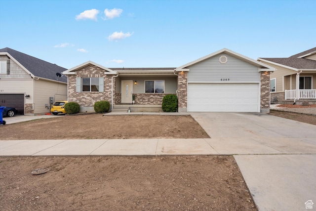 6263 W Oak Gate Dr, West Jordan, UT 84081 - single story home featuring driveway, a garage, covered porch, and brick siding
