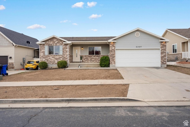 6263 W Oak Gate Dr, West Jordan, UT 84081 - single story home with brick siding, driveway, and a garage