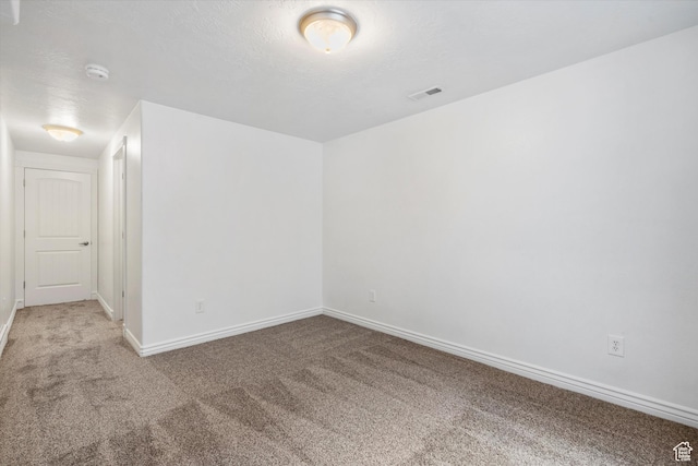 6263 W Oak Gate Dr, West Jordan, UT 84081 - spare room featuring baseboards, visible vents, and carpet floors