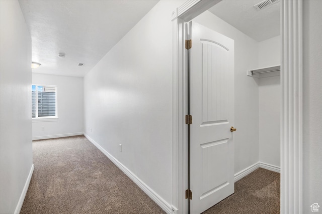 6263 W Oak Gate Dr, West Jordan, UT 84081 - hallway featuring baseboards, visible vents, and carpet flooring
