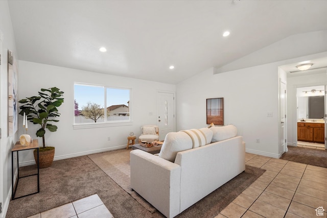 6263 W Oak Gate Dr, West Jordan, UT 84081 - living area with light tile patterned flooring, light carpet, baseboards, lofted ceiling, and recessed lighting