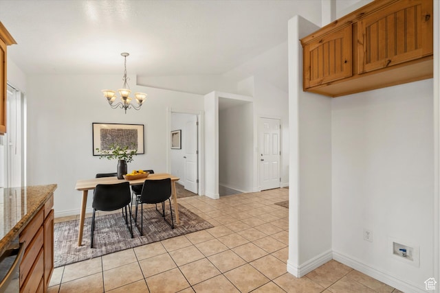 6263 W Oak Gate Dr, West Jordan, UT 84081 - dining area featuring a chandelier, baseboards, light tile patterned flooring, and vaulted ceiling