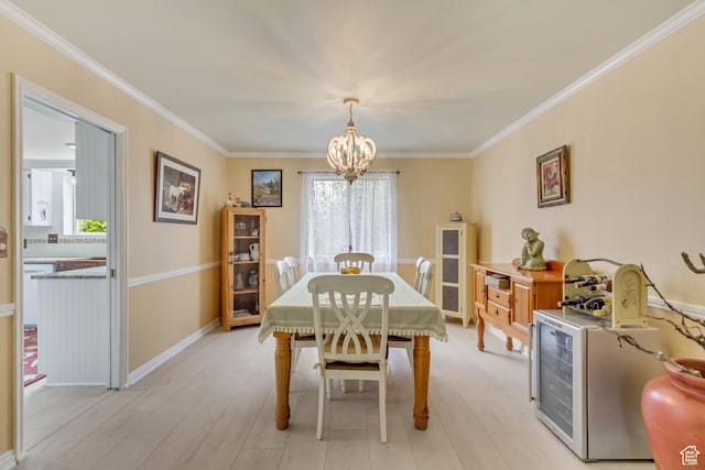 982 E 315 S, Orem, UT 84097 - dining room featuring baseboards, a chandelier, and crown molding