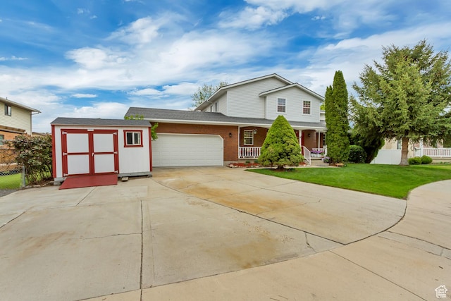 982 E 315 S, Orem, UT 84097 - traditional-style home featuring fence, concrete driveway, an attached garage, covered porch, and a front yard