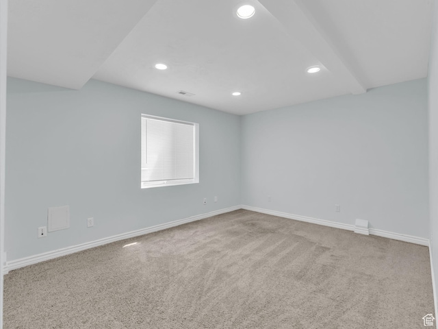 empty room featuring recessed lighting, carpet floors, and baseboards