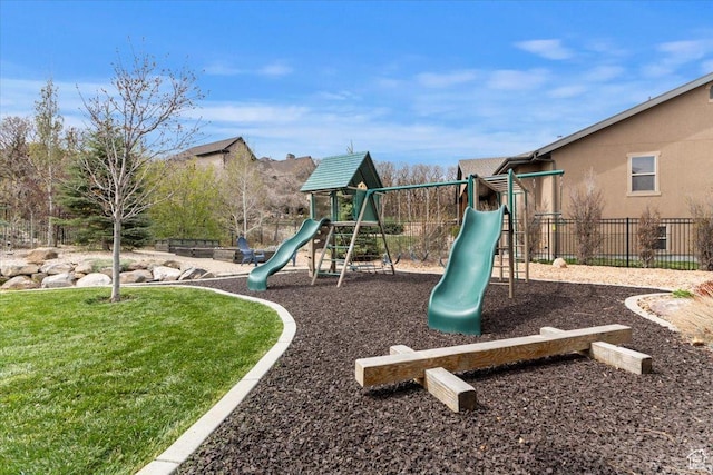 community jungle gym featuring fence