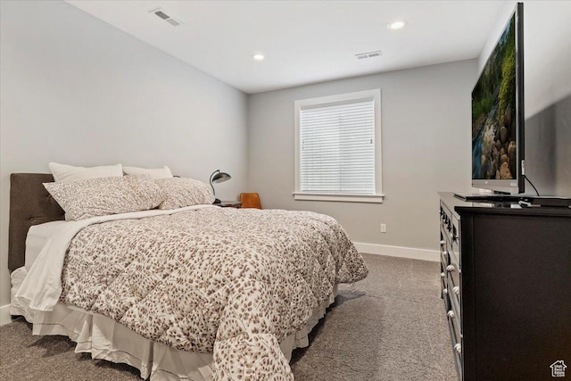 bedroom featuring dark colored carpet, baseboards, and recessed lighting