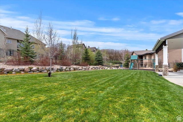 view of yard featuring a playground