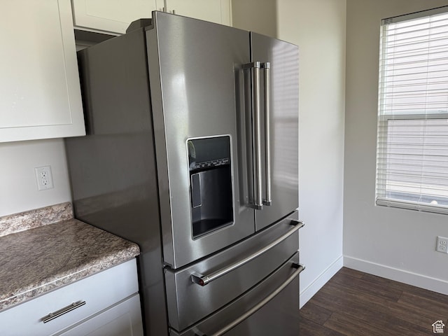 3678 W Sunrise Sky Ln S, South Jordan, UT 84009 - kitchen with stainless steel fridge, dark wood-type flooring, and white cabinetry