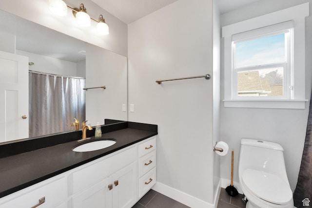 2385 E 430 S, Spanish Fork, UT 84660 - bathroom with tile patterned floors, toilet, vanity, a shower with curtain, and baseboards