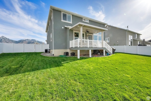 2385 E 430 S, Spanish Fork, UT 84660 - rear view of property featuring stairway, a fenced backyard, a ceiling fan, and a yard