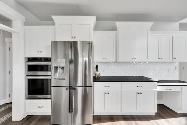 2385 E 430 S, Spanish Fork, UT 84660 - kitchen featuring white cabinets, appliances with stainless steel finishes, dark countertops, and dark wood-style floors