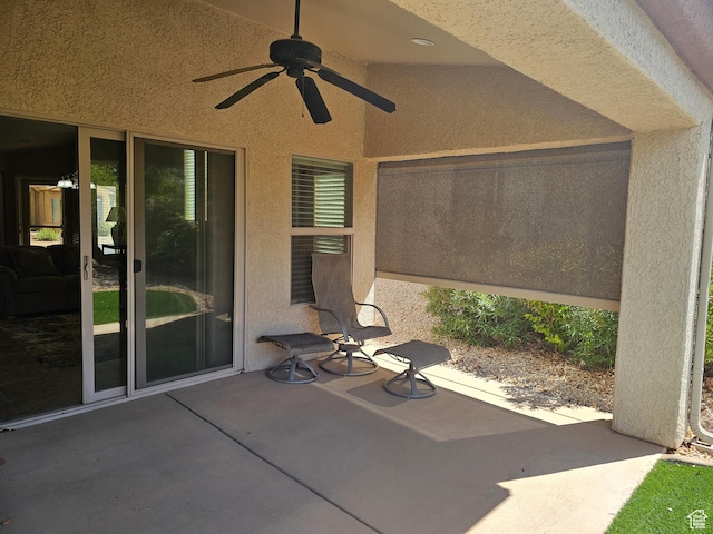 view of patio featuring a ceiling fan