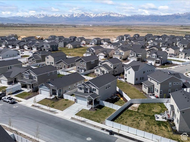 aerial view featuring a mountain view and a residential view