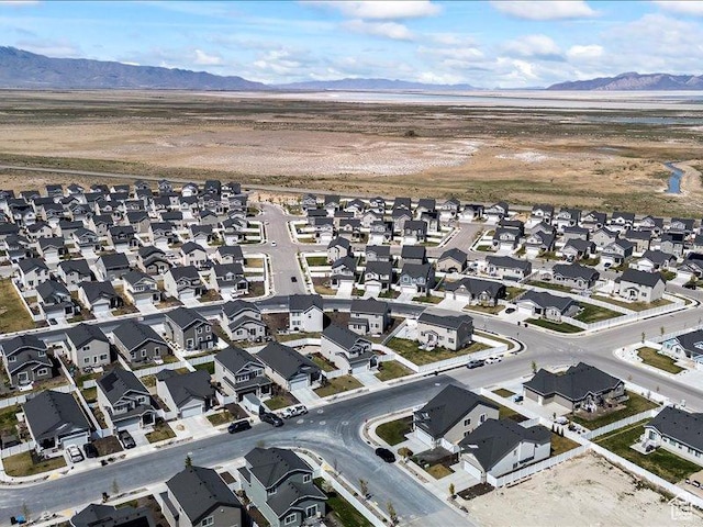 birds eye view of property featuring a residential view and a mountain view