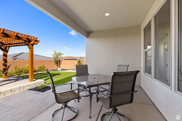 315 W Camino Borde, Washington, UT 84780 - view of patio / terrace with fence, a pergola, and outdoor dining space