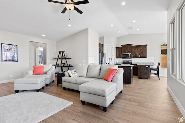 315 W Camino Borde, Washington, UT 84780 - living area with light wood-style floors, lofted ceiling, baseboards, and ceiling fan
