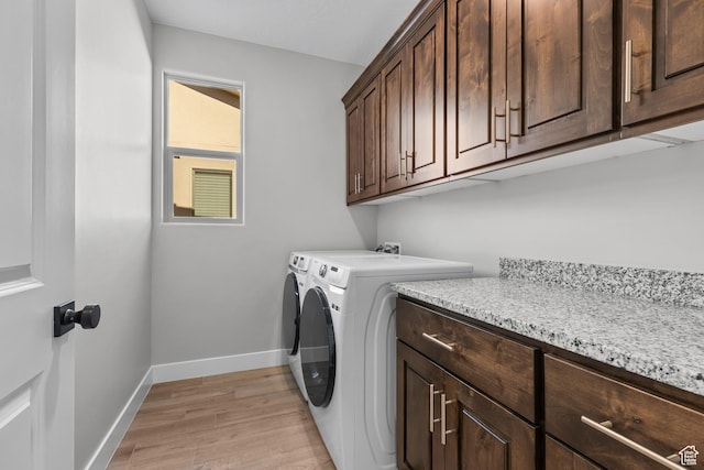 315 W Camino Borde, Washington, UT 84780 - laundry room with baseboards, cabinet space, light wood finished floors, and independent washer and dryer