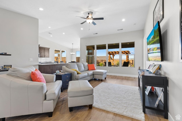 315 W Camino Borde, Washington, UT 84780 - living room with vaulted ceiling, a ceiling fan, light wood finished floors, visible vents, and recessed lighting