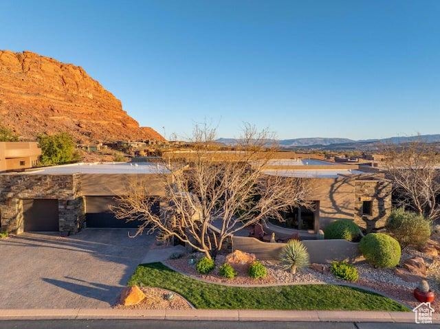 3052 N Snow Canyon Pkwy Unit 67, St George, UT 84770 - view of front facade featuring driveway and a mountain view