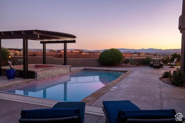 3052 N Snow Canyon Pkwy Unit 67, St George, UT 84770 - view of swimming pool with a fenced backyard, a patio, a fenced in pool, and an in ground hot tub