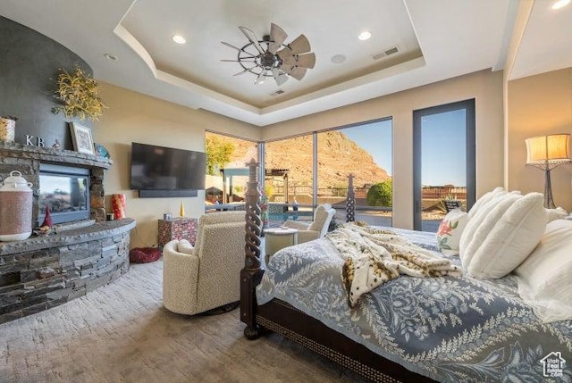 3052 N Snow Canyon Pkwy Unit 67, St George, UT 84770 - bedroom featuring recessed lighting, a tray ceiling, wood finished floors, visible vents, and ceiling fan