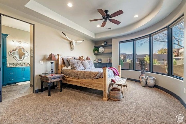 3052 N Snow Canyon Pkwy Unit 67, St George, UT 84770 - carpeted bedroom featuring ensuite bath, baseboards, recessed lighting, and a raised ceiling