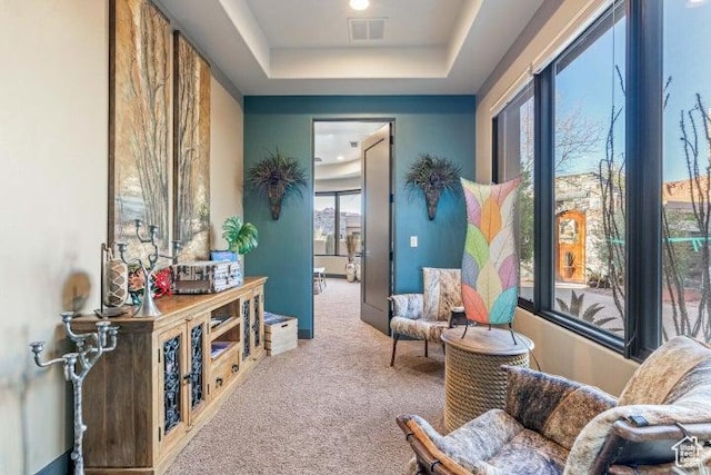 3052 N Snow Canyon Pkwy Unit 67, St George, UT 84770 - living area with carpet flooring, visible vents, and a raised ceiling