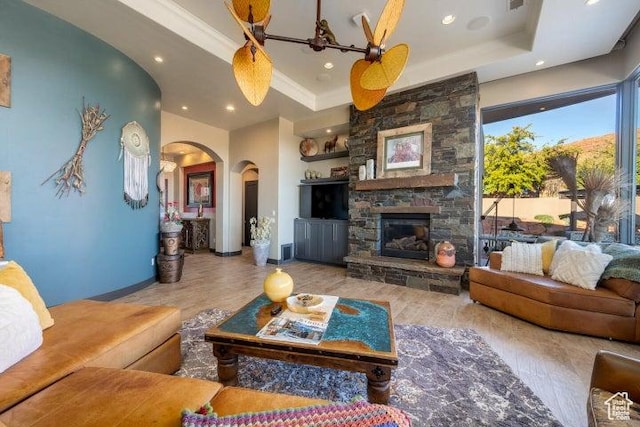 3052 N Snow Canyon Pkwy Unit 67, St George, UT 84770 - living room featuring a tray ceiling, arched walkways, wood finished floors, and recessed lighting