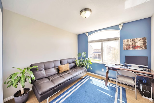 office space with baseboards