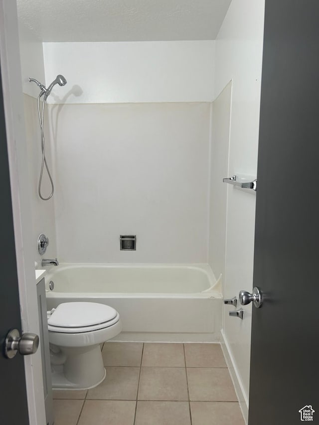full bath with toilet, tile patterned flooring, tub / shower combination, and vanity
