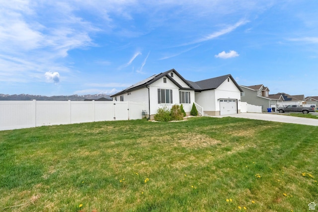 614 S Woodruff Way, Grantsville, UT 84029 - single story home featuring fence, a garage, a front yard, and concrete driveway