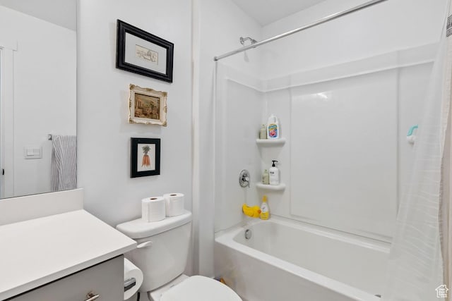 bathroom with shower / bath combo, vanity, and toilet