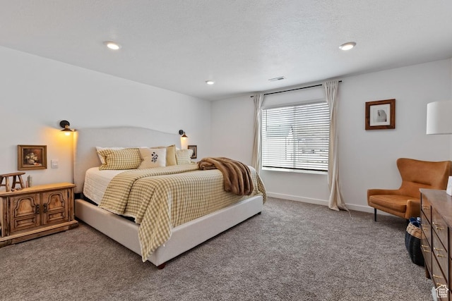 carpeted bedroom featuring baseboards, visible vents, and recessed lighting