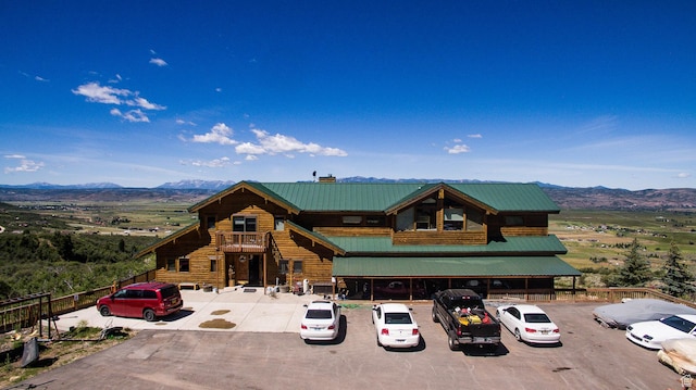 exterior space featuring a mountain view