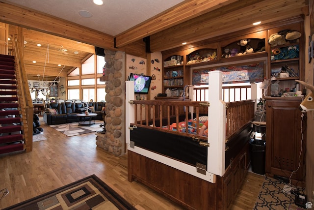 3090 N Rocky Rd E, Kamas, UT 84036 - bedroom featuring wood finished floors, vaulted ceiling with beams, and recessed lighting